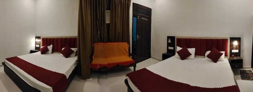 Imagen de la habitación del Hotel RAGHAV STAY INN. Foto 12