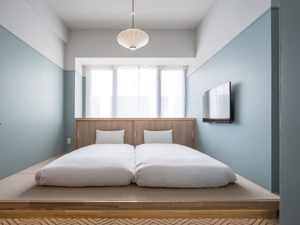 Imagen de la habitación del Hotel RAKURO Kyoto by THE SHARE. Foto 7
