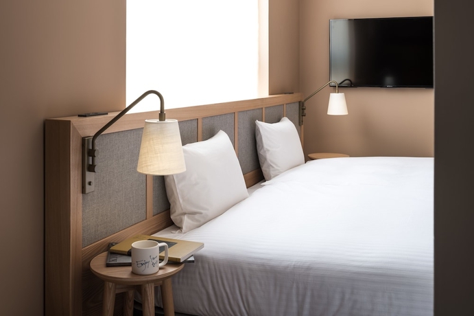 Imagen de la habitación del Hotel RAKURO Kyoto by THE SHARE. Foto 9