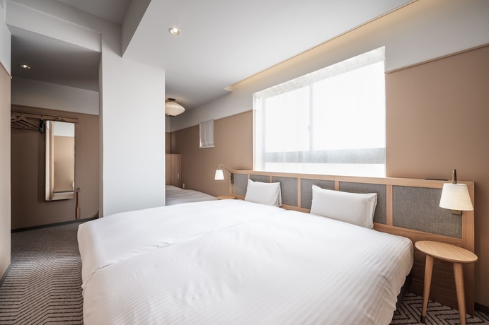 Imagen de la habitación del Hotel RAKURO Kyoto by THE SHARE. Foto 10