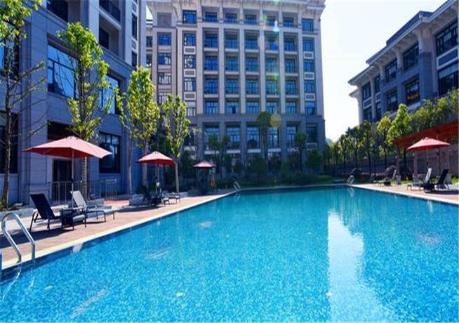 Imagen de la piscina del Hotel RAMADA WUYISHAN. Foto 16