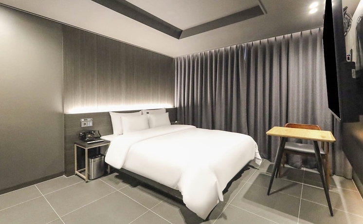 Imagen de la habitación del Hotel RAMPART HOTEL. Foto 10