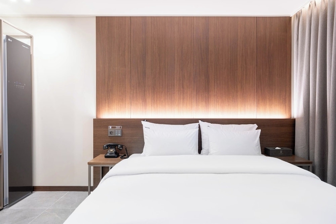 Imagen de la habitación del Hotel RAMPART HOTEL. Foto 13