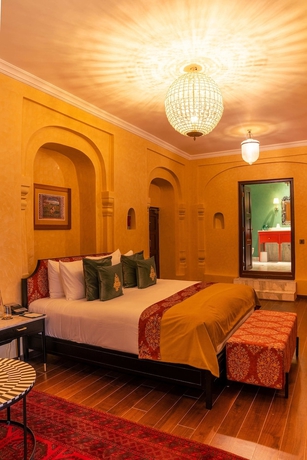 Imagen de la habitación del Hotel RAN BAAS The Palace. Foto 1