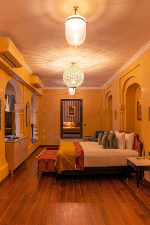 Imagen de la habitación del Hotel RAN BAAS The Palace. Foto 4