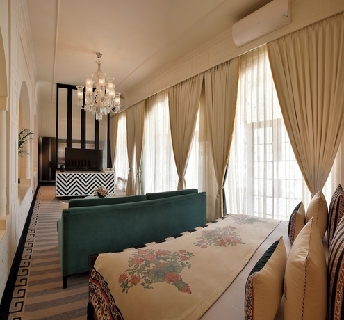 Imagen de la habitación del Hotel RAN BAAS The Palace. Foto 14