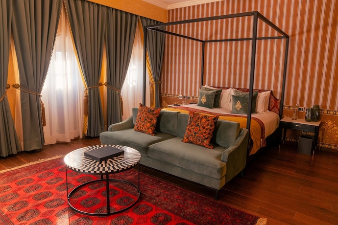 Imagen de la habitación del Hotel RAN BAAS The Palace. Foto 16
