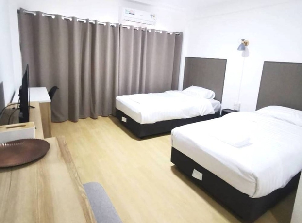 Imagen de la habitación del Hotel RATANASIRI HOTEL. Foto 6