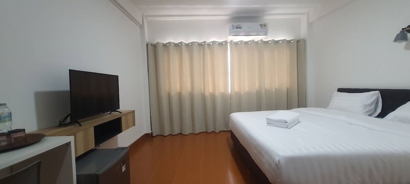 Imagen de la habitación del Hotel RATANASIRI HOTEL. Foto 9