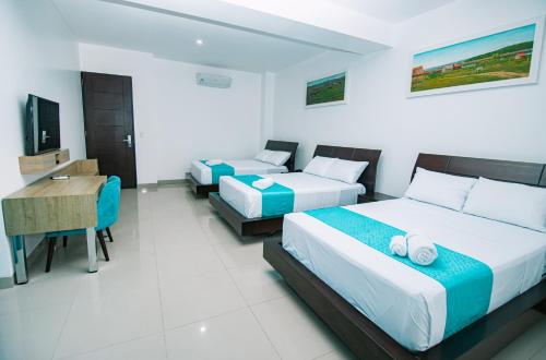 Imagen de la habitación del Hotel RBB BRITO HOTEL. Foto 17