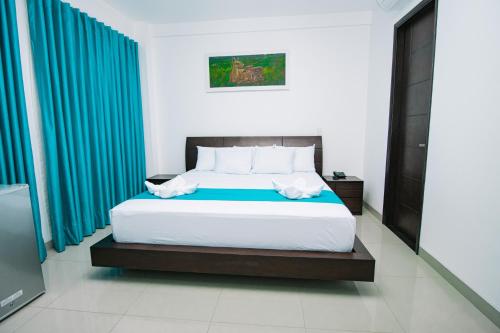 Imagen de la habitación del Hotel RBB BRITO HOTEL. Foto 18