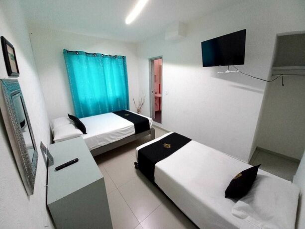 Imagen de la habitación del Hotel RCH Suite. Foto 12