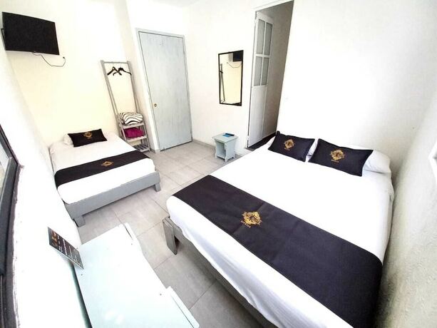 Imagen de la habitación del Hotel RCH Suite. Foto 13