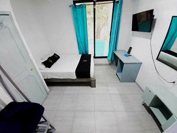 Imagen de la habitación del Hotel RCH Suite. Foto 14