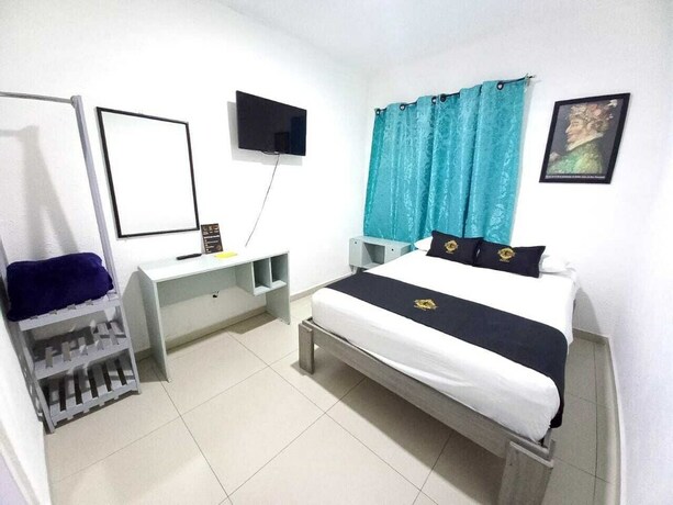 Imagen de la habitación del Hotel RCH Suite. Foto 19