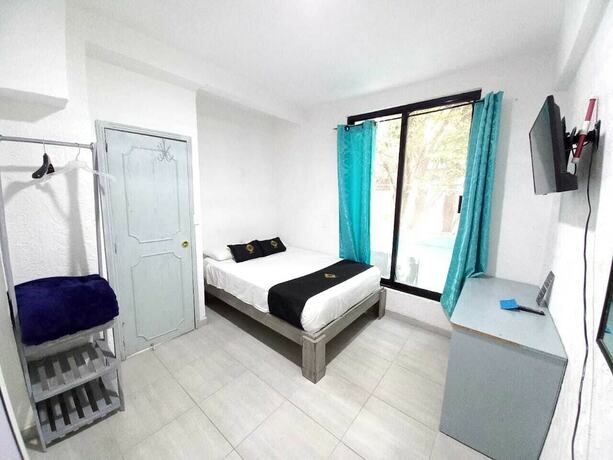Imagen de la habitación del Hotel RCH Suite. Foto 20