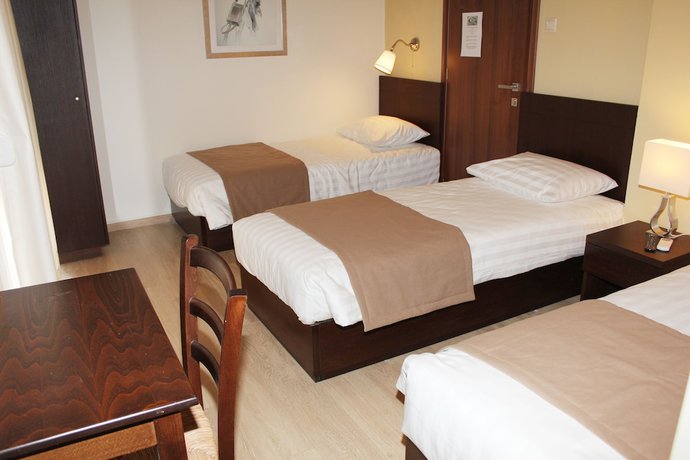 Imagen de la habitación del Hotel REA, Heraklion. Foto 9