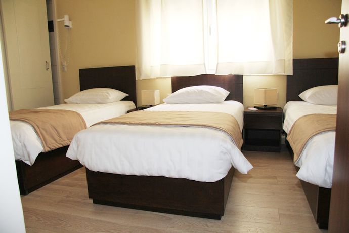 Imagen de la habitación del Hotel REA, Heraklion. Foto 14
