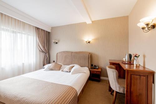 Imagen de la habitación del Hotel RED CONFORT HOTEL Boutique. Foto 8