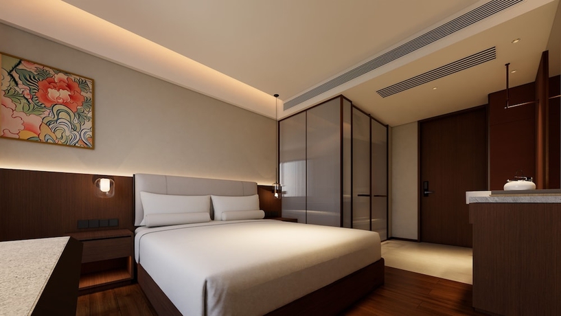 Imagen de la habitación del Hotel RED WALL HOTEL. Foto 2
