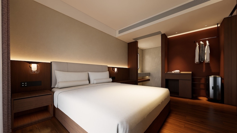 Imagen de la habitación del Hotel RED WALL HOTEL. Foto 4