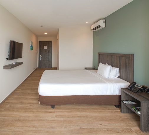 Imagen de la habitación del Hotel REEC Machala by Oro Verdes. Foto 2