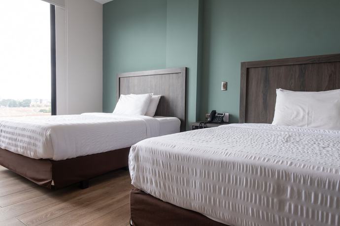 Imagen de la habitación del Hotel REEC Machala by Oro Verdes. Foto 15