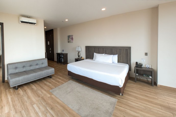 Imagen de la habitación del Hotel REEC Machala by Oro Verdes. Foto 16