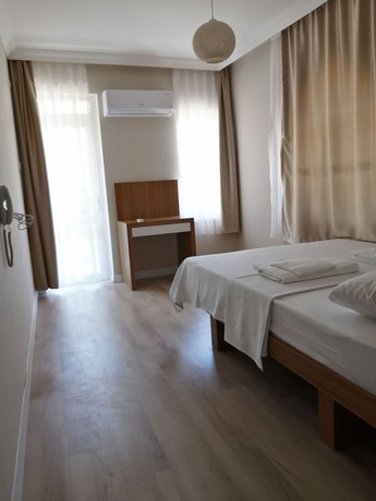 Imagen de la habitación del Hotel REGA OTEL. Foto 12