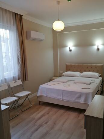 Imagen de la habitación del Hotel REGA OTEL. Foto 14