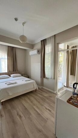 Imagen de la habitación del Hotel REGA OTEL. Foto 15