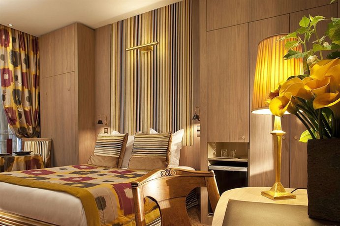 Imagen de la habitación del Hotel REGENT`S GARDEN. Foto 12