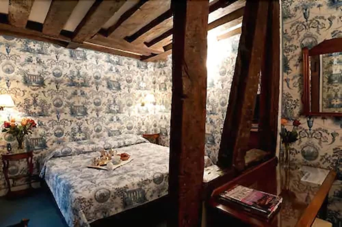 Imagen de la habitación del Hotel RELAIS HOTEL DU VIEUX. Foto 8