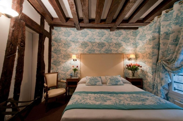 Imagen de la habitación del Hotel RELAIS HOTEL DU VIEUX. Foto 11