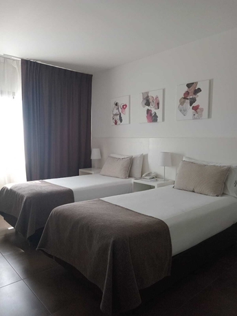 Imagen de la habitación del Hotel RENTAL SUITES CAMPANA. Foto 2