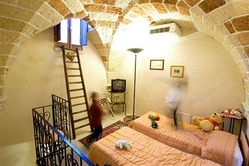 Imagen de la habitación del Hotel RESIDENCE PALAZZO BALDI. Foto 6