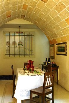 Imagen del bar/restaurante del Hotel RESIDENCE PALAZZO BALDI. Foto 2