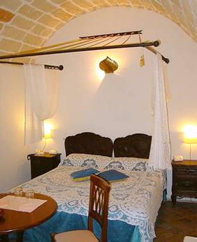 Imagen de la habitación del Hotel RESIDENCE PALAZZO BALDI. Foto 7