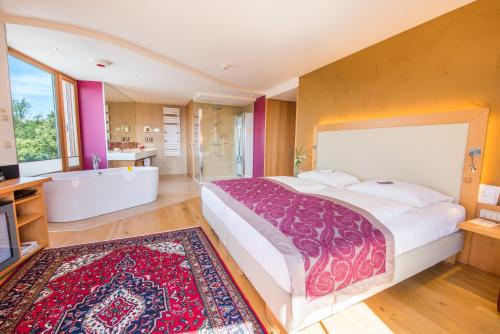 Imagen de la habitación del Hotel RETTER Bio-Natur-Resort. Foto 16