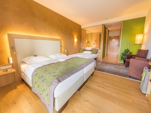 Imagen de la habitación del Hotel RETTER Bio-Natur-Resort. Foto 19