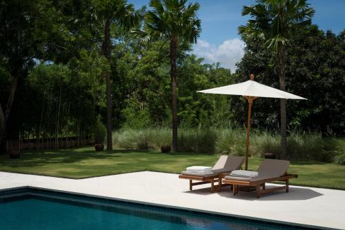 Imagen de la habitación del Hotel REVĪVŌ Wellness Resort Nusa Dua Bali. Foto 9