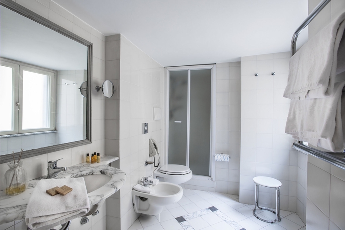 Imagen de la habitación del Hotel REX, Roma. Foto 14