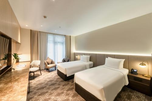 Imagen de la habitación del Hotel REY Hanoi. Foto 18