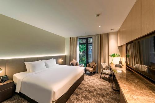 Imagen de la habitación del Hotel REY Hanoi. Foto 19