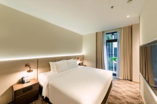 Imagen de la habitación del Hotel REY Hanoi. Foto 20