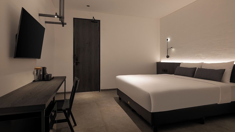 Imagen de la habitación del Hotel REZ Semarang. Foto 5