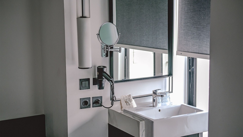 Imagen de la habitación del Hotel REZ Semarang. Foto 8