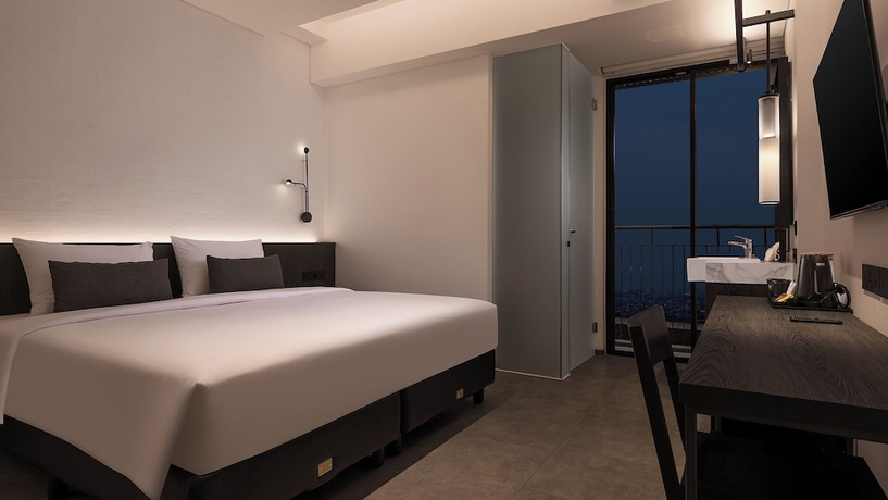Imagen de la habitación del Hotel REZ Semarang. Foto 10