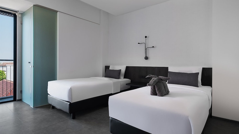 Imagen de la habitación del Hotel REZ Semarang. Foto 13