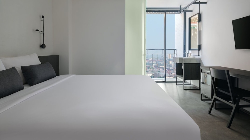 Imagen de la habitación del Hotel REZ Semarang. Foto 14